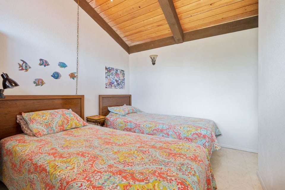 The 2 twins bedroom loft bedroom!  It's on the other side of Queen Sized Bed Loft Bedroom. The Bathroom separates this sleeping area from the Queen Bed Sleeping Area Upstairs