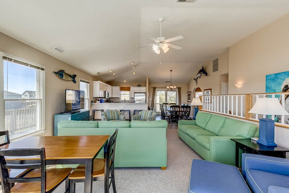 Top-Level Living Room with Deck Access