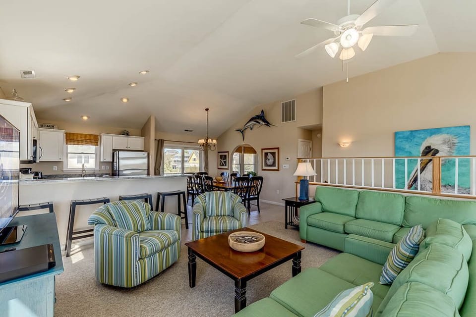 Top-Level Living Room with Deck Access