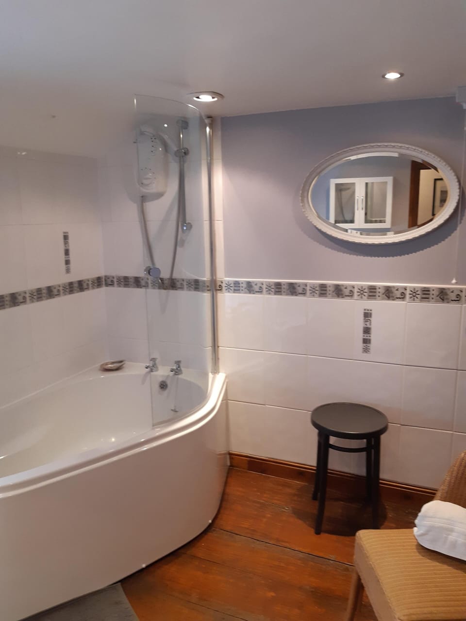 Electric shower over large bath