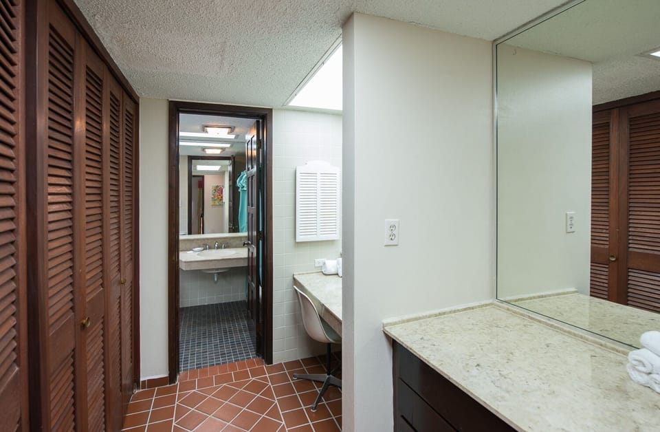 suite #4 Dressing Room with Vanities and full wall closets