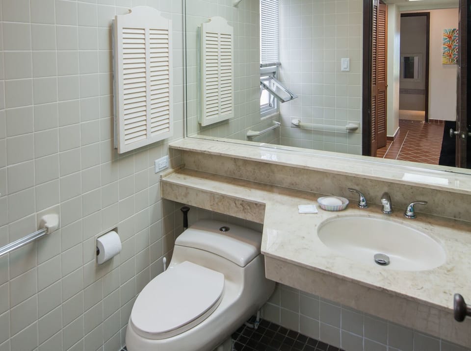 Suite #4 private full bath/tub and shower off Dressing room.w/vanity with sink