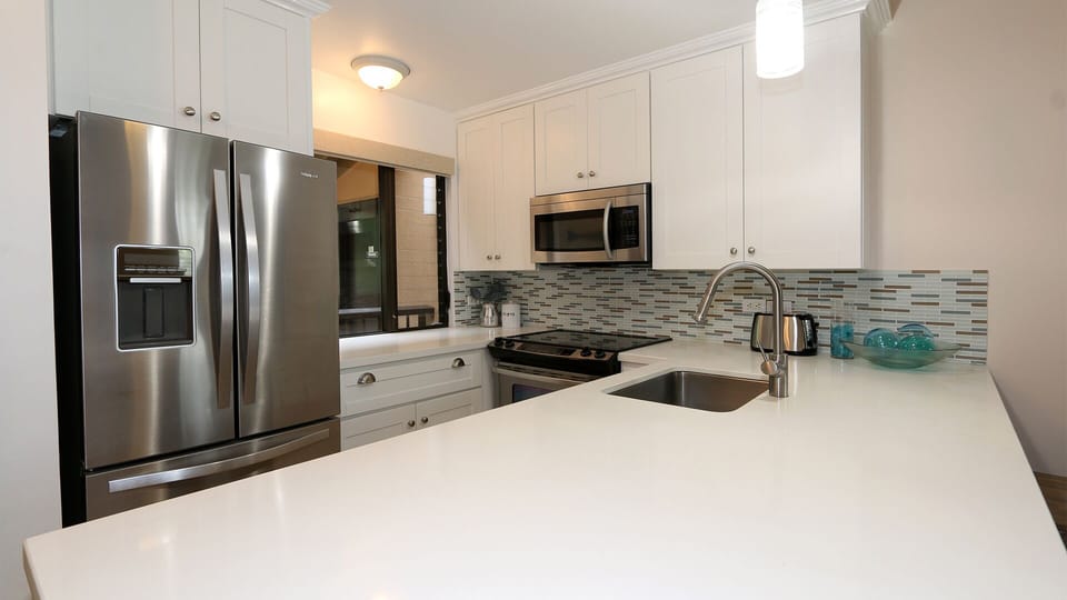 Well stocked kitchen to assemble or cook your meals.