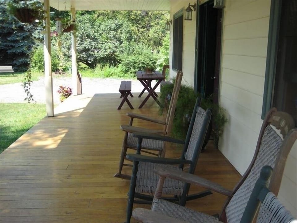 Front porch with rocking chairs
