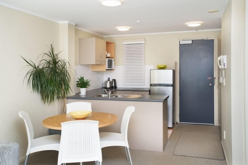 Dining, kitchen and front door