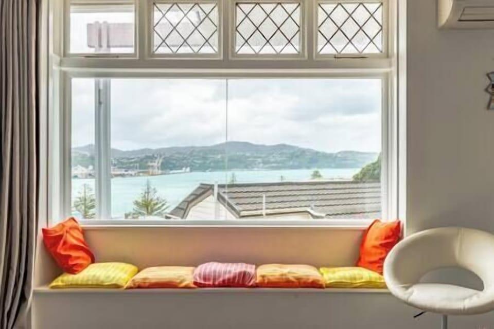 Relax on the window seat while watching all the activities on the harbour.