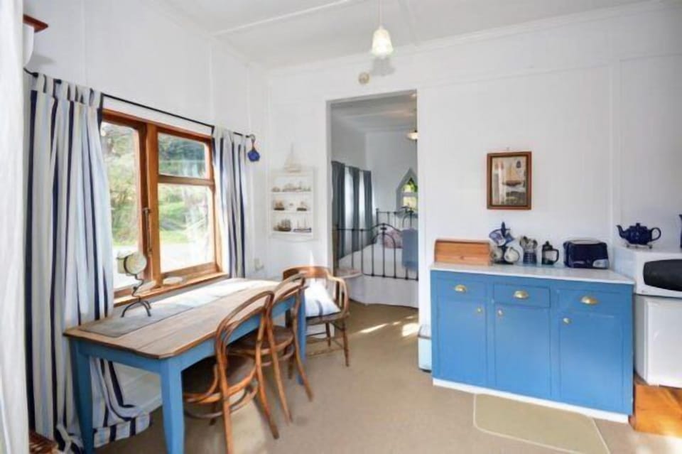 Kitchen and dining table to bedroom.