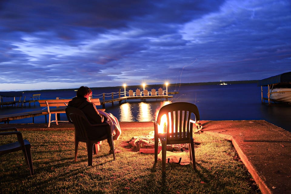 Lakeside lawn and fire pit.
