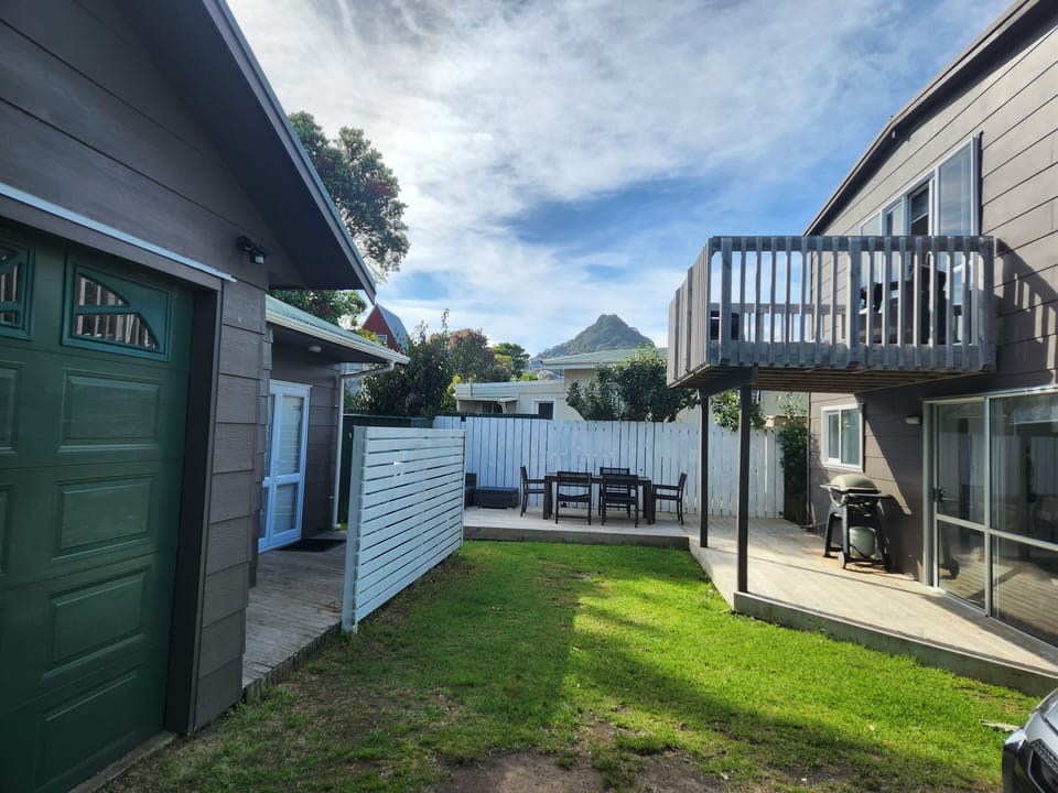 Back deck and permanent resident living in unit on left of photo