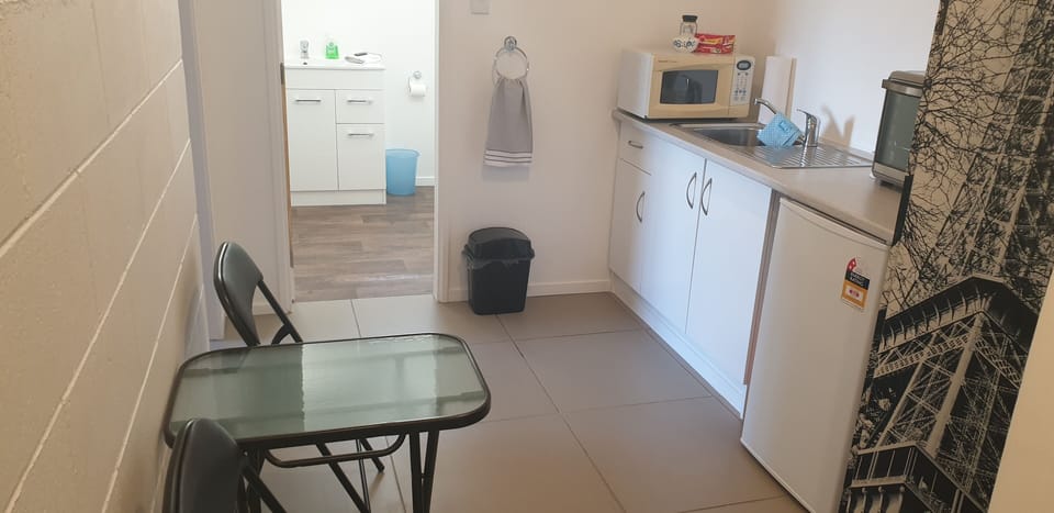 Downstairs self contained area. Kichenette/ laundry area