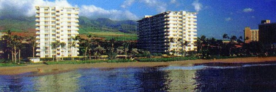 The iconic Whaler Towers as seen from out in the blue Pacific 