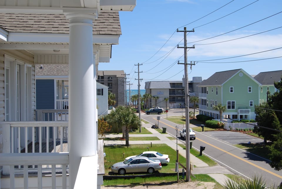 Upstairs Master Bedroom view from Balcony to the beach.