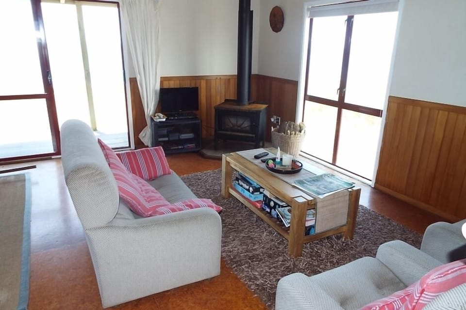 Open plan living area with fireplace