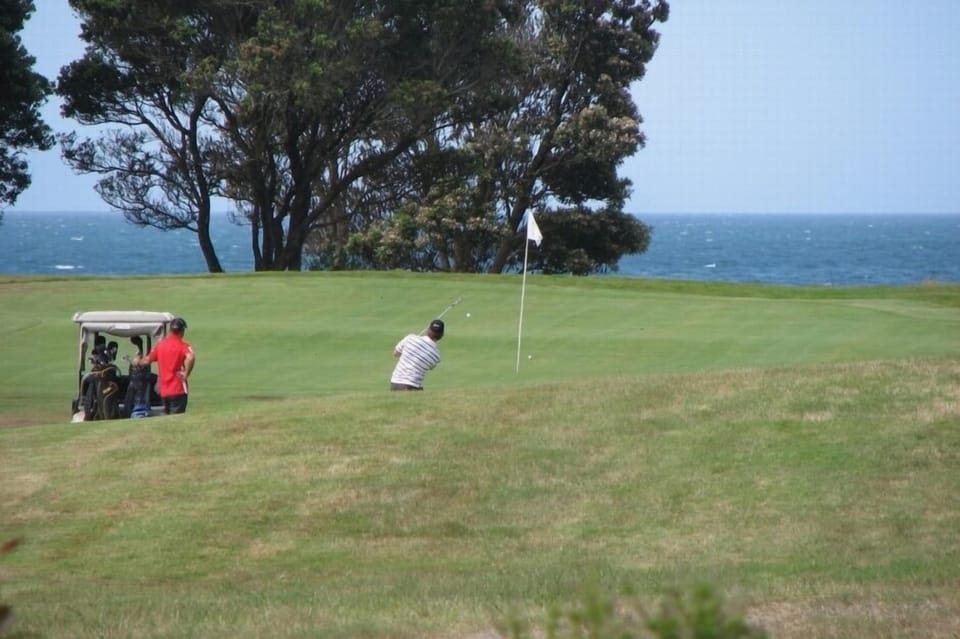 #1 green and the ocean within view