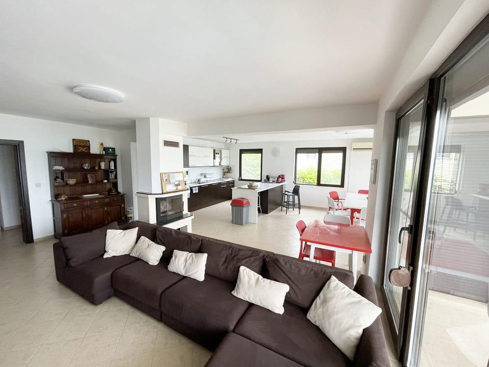 Lounge with open plan kitchen June 2025