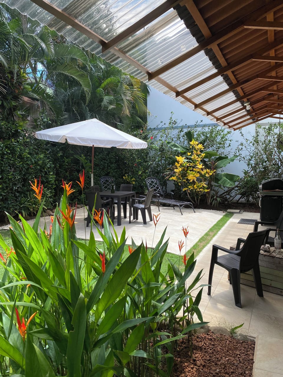 A cozy backyard terrace. Great for barbecuing, outdoor dining or morning coffee!