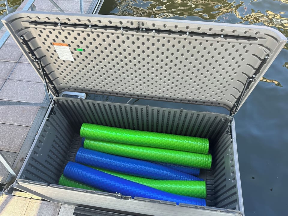 Dock box has 8 floating noodles for you to use to float away in Mill Creek Cove