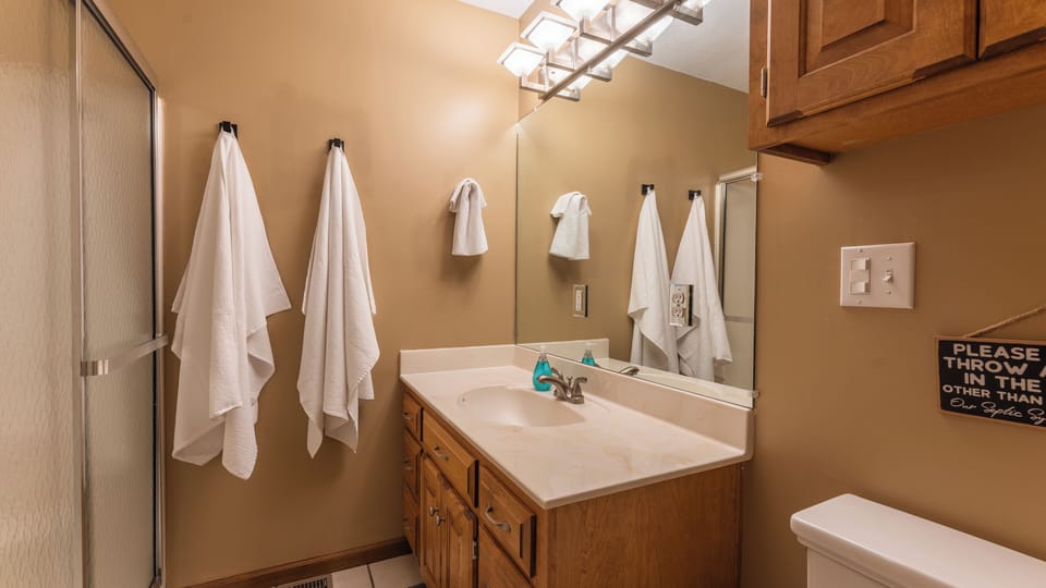 En suite primary bathroom with walk-in shower.