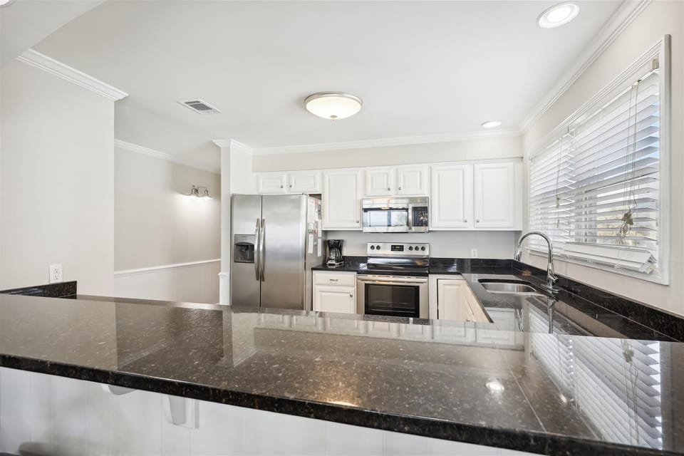 (2 of 2 kitchens) Sit down to a home cooked meal as a family. 