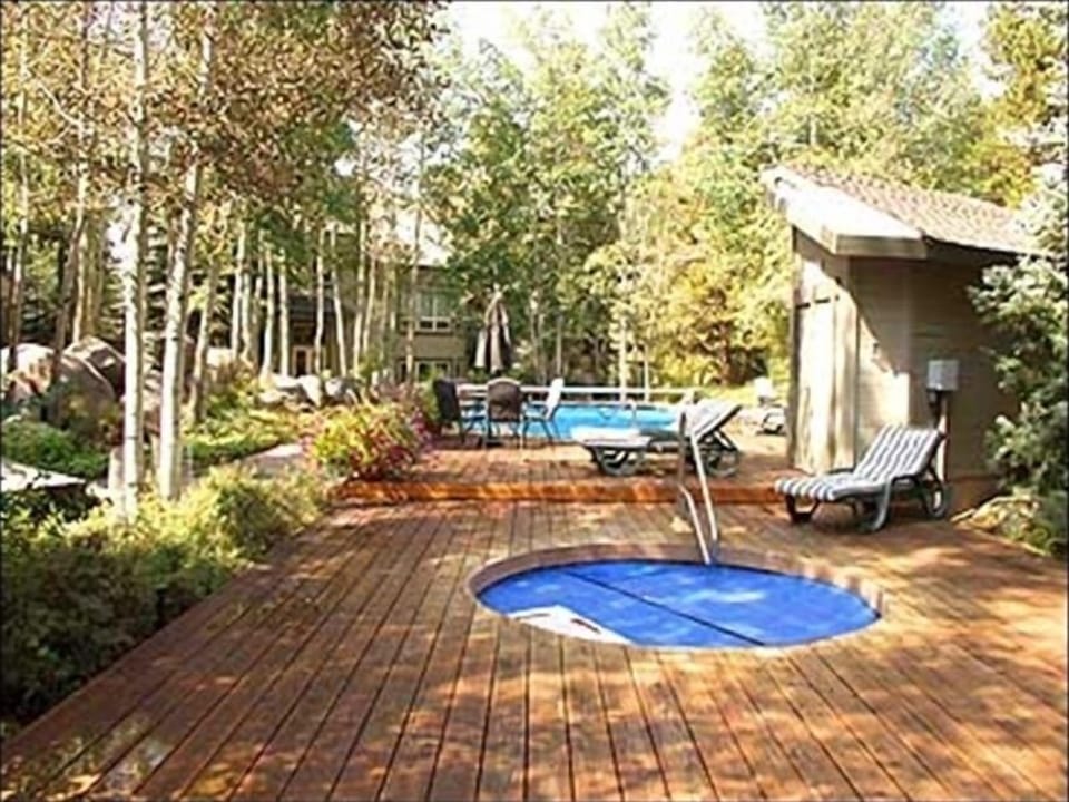 Year round heated pool. Hot tub has been replaced with a larger tub.  