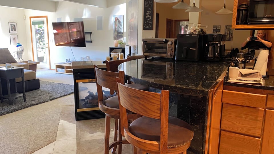 Kitchenette with bar top sitting area