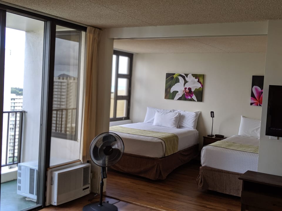 Two queen beds in bedroom