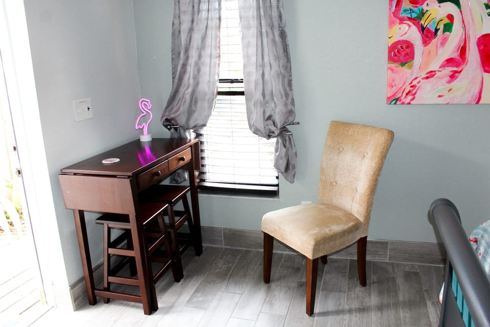“Breakfast nook for two — enjoy morning coffee or a quiet snack indoors.”