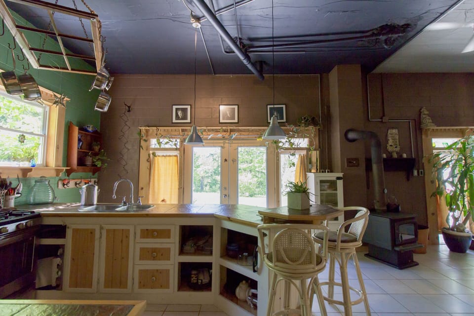 View of the kitchen from the second bedroom door 