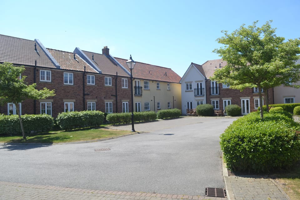 Communal car parking to the rear of East Coast Escape