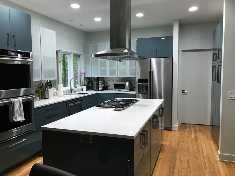 Thermador gas cooktop and Kitchenaid electric ovens and frig