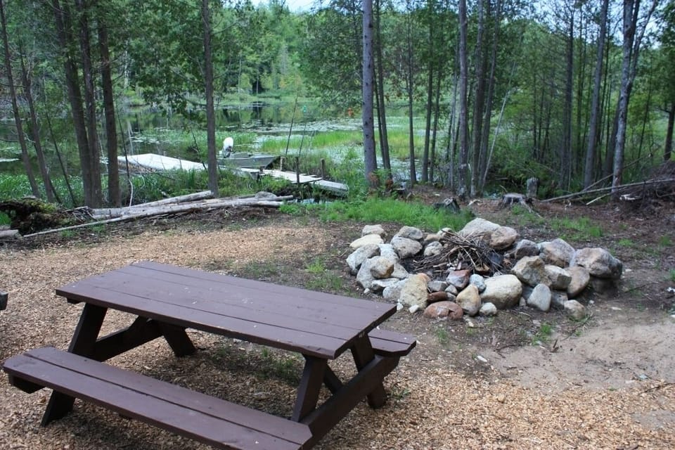 Lean-to with picnic table, fire-pit and waterfront 