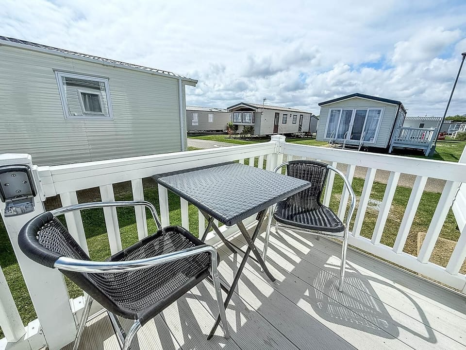This personal patch of the outdoors extends your living area, providing a perfect spot to enjoy the fresh seaside air.