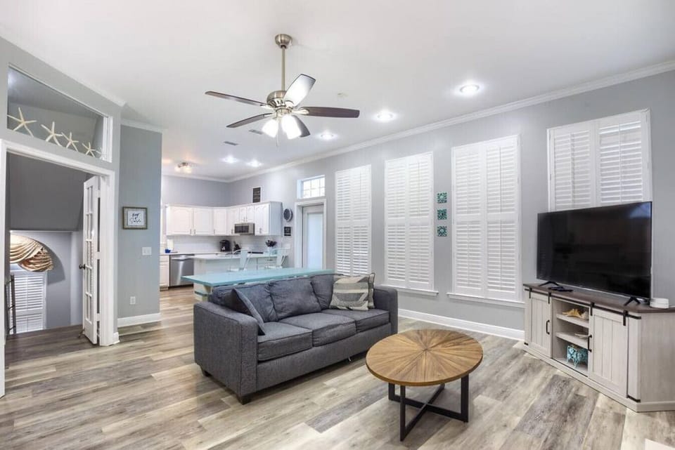 Open-concept living room with smart TV