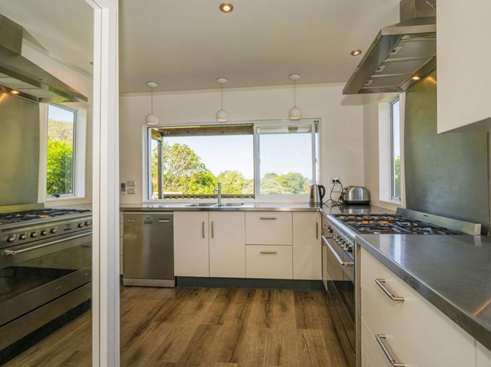 Cooking with a view. Slider windows open right up.