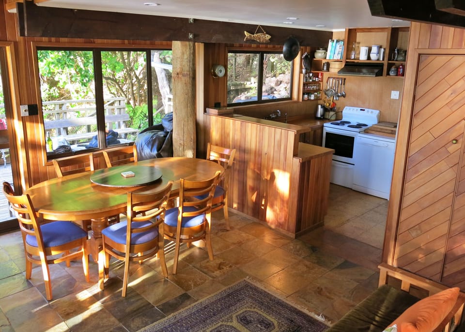 The dining room and kitchen.