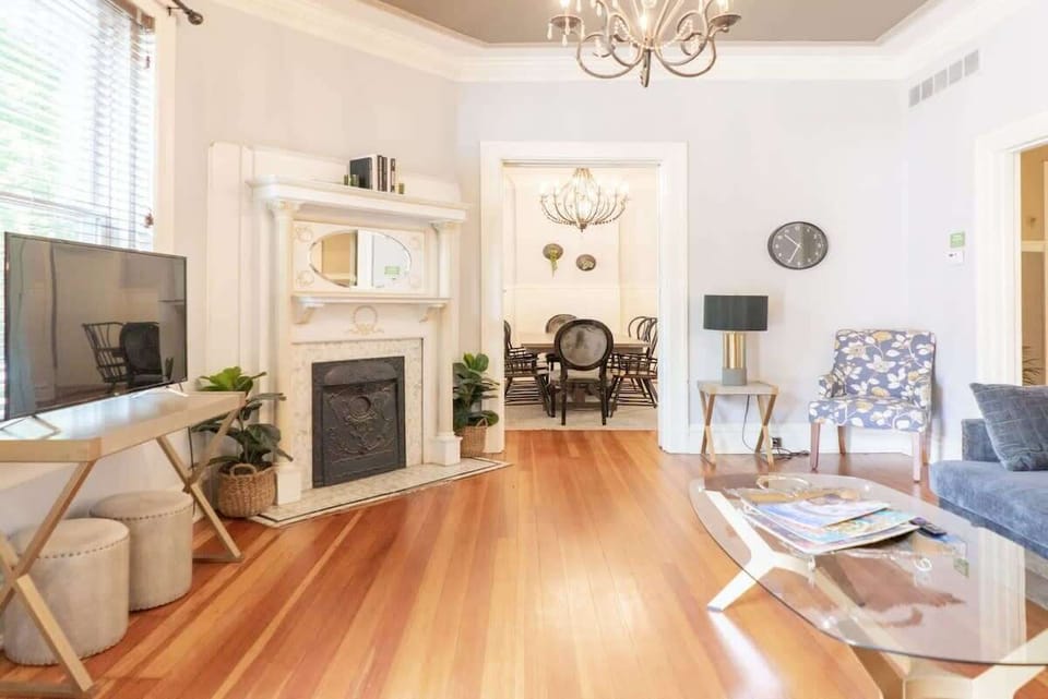 Relax by the decorative fireplace and enjoy the classic charm that makes this home feel warm and inviting. #CozyVibes #CharmingHome