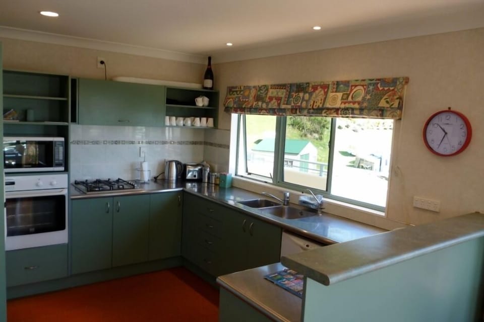 Well equipped, practical kitchen with great views.