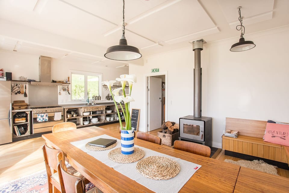 Large kitchen/dining area with wood burner