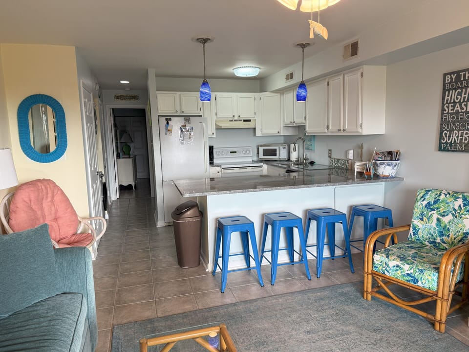 Newly renovated kitchen with granite countertops. Kitchen is fully stocked. 