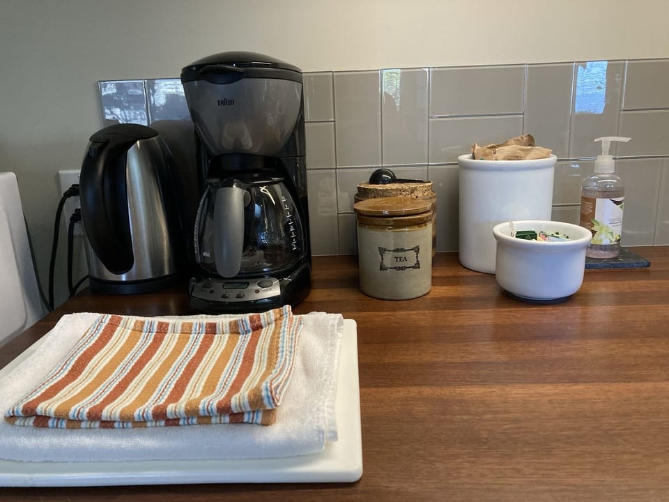Coffee, teas, creamers in fridge