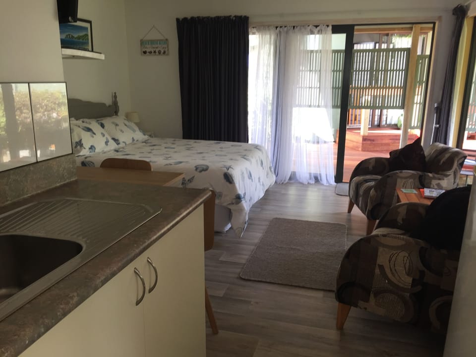 View from the kitchen into the room .
