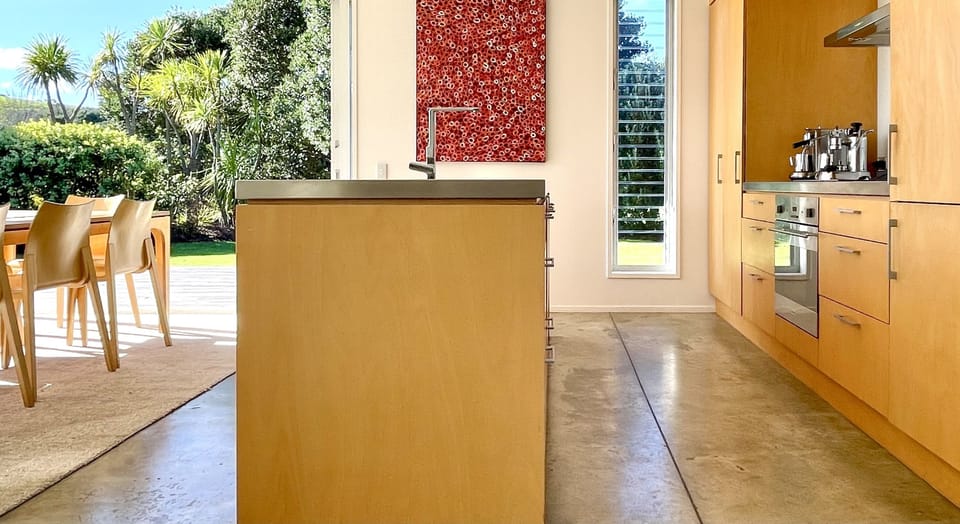 Galley style kitchen with island bench
