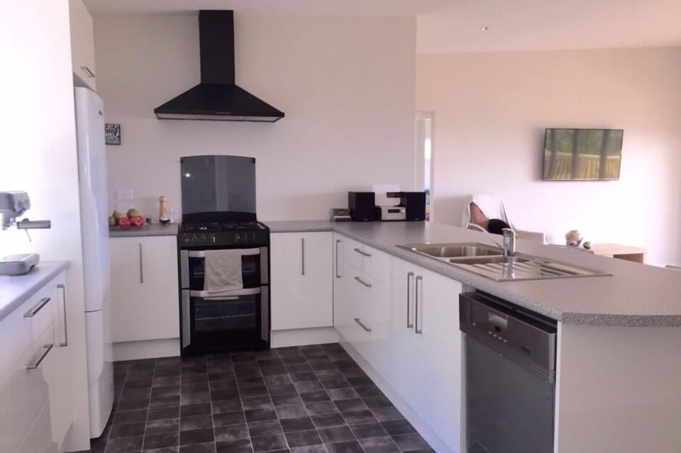 Kitchen with gas hobs and electric oven