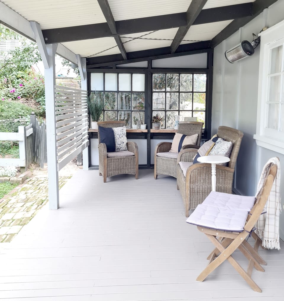 Sheltered verandah, comfortable seating and outdoor heating