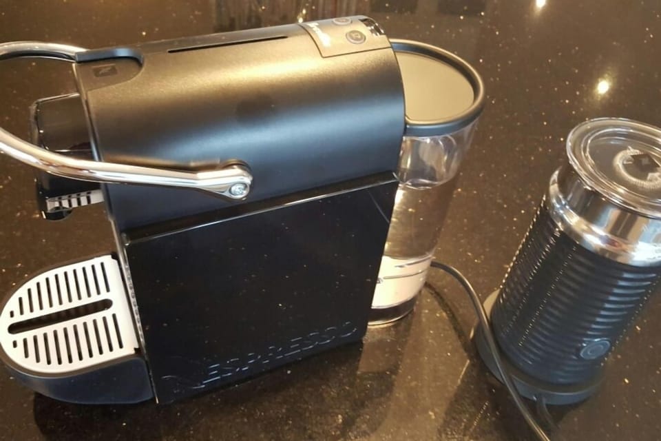 New Nespresso Coffee machine - bring capsules