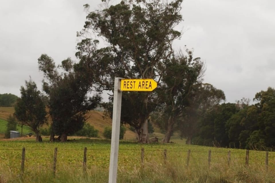 Look for this sign pointing down the driveway