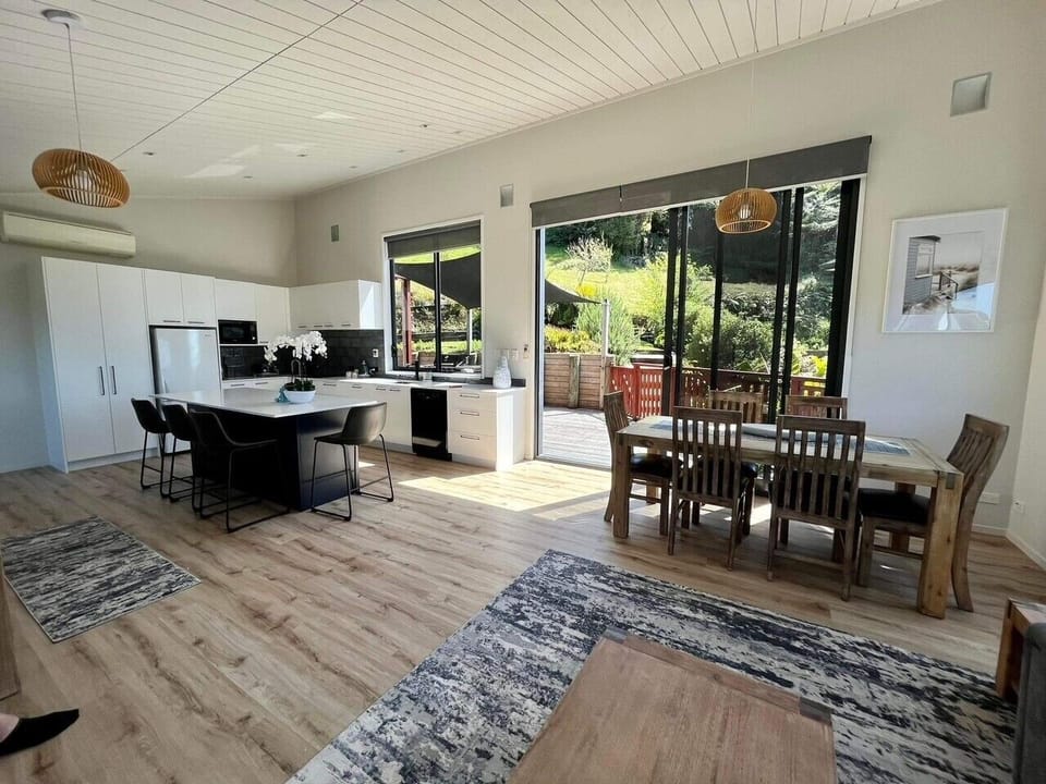 The Dining area leads onto the upstairs deck