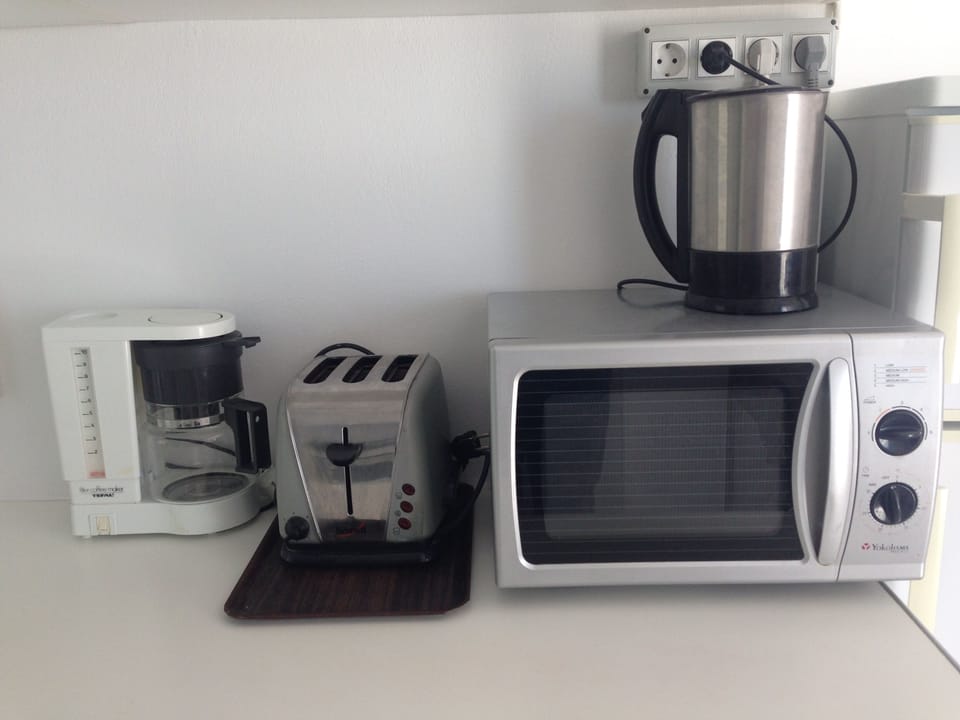 kettle, coffee maker, toaster and microwave