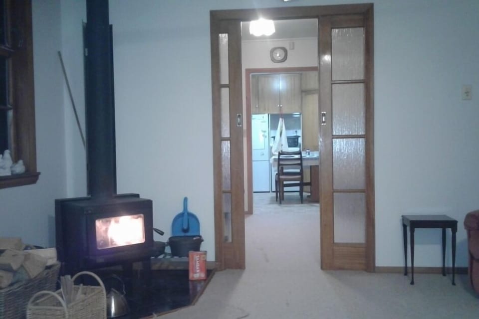 dividing sliding door between lounge and kitchen
