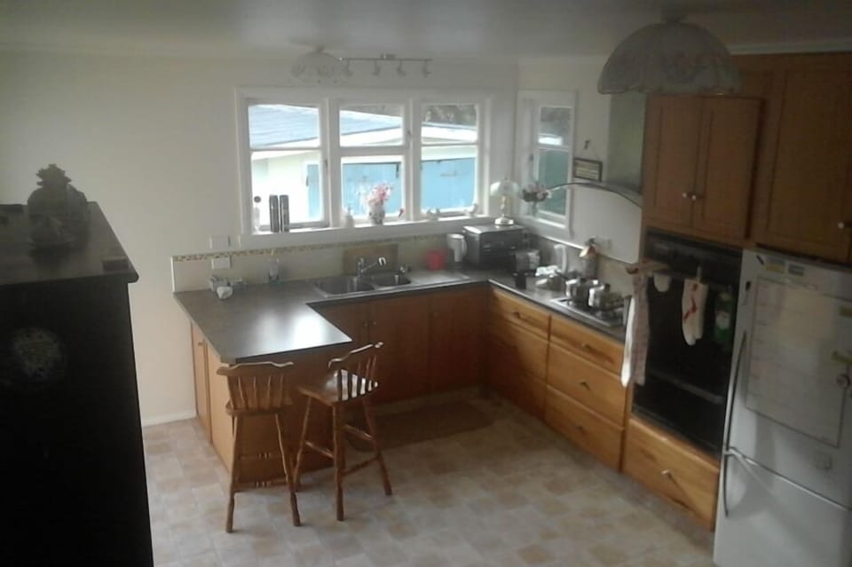 the roomy  sunny self-contained kitchen